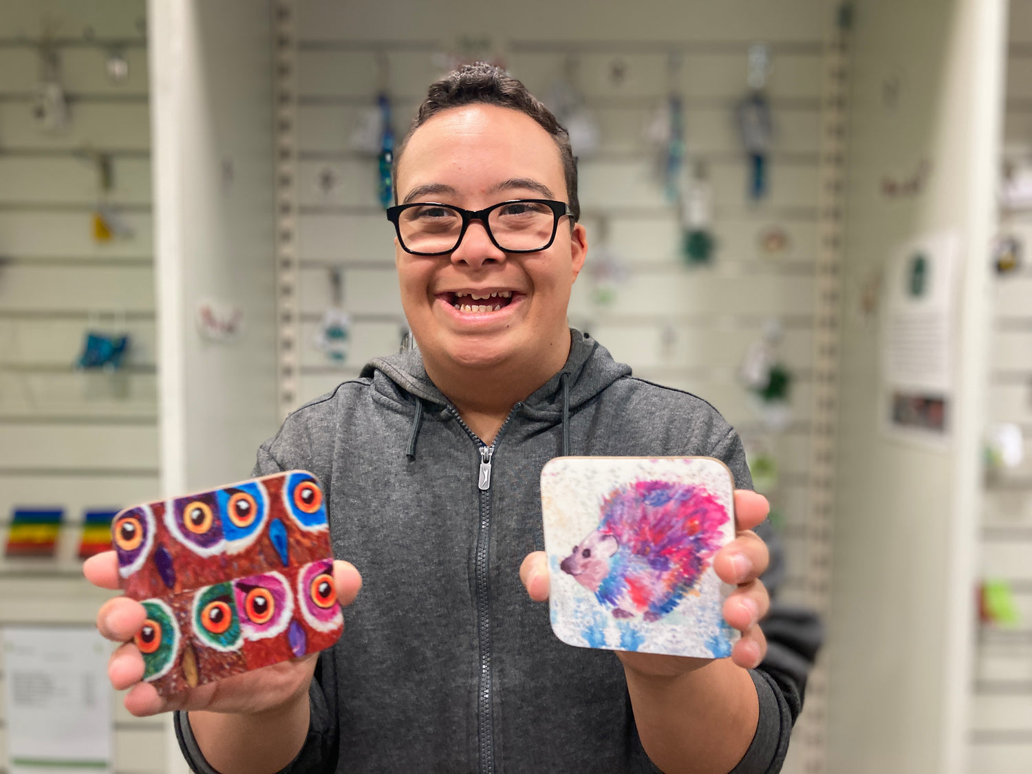 Sam Hows holding StarPrint mug